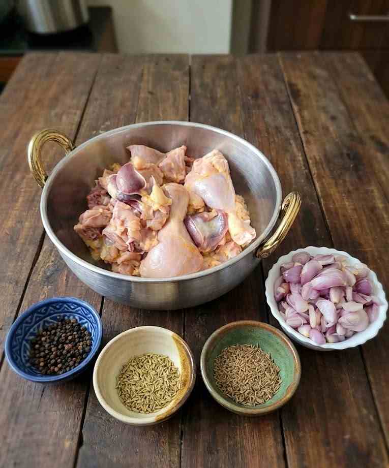 Spices for Milagu Chicken Varuval: Fresh black pepper, cumin, fennel seeds, and shallots for South Indian Pepper Chicken Fry