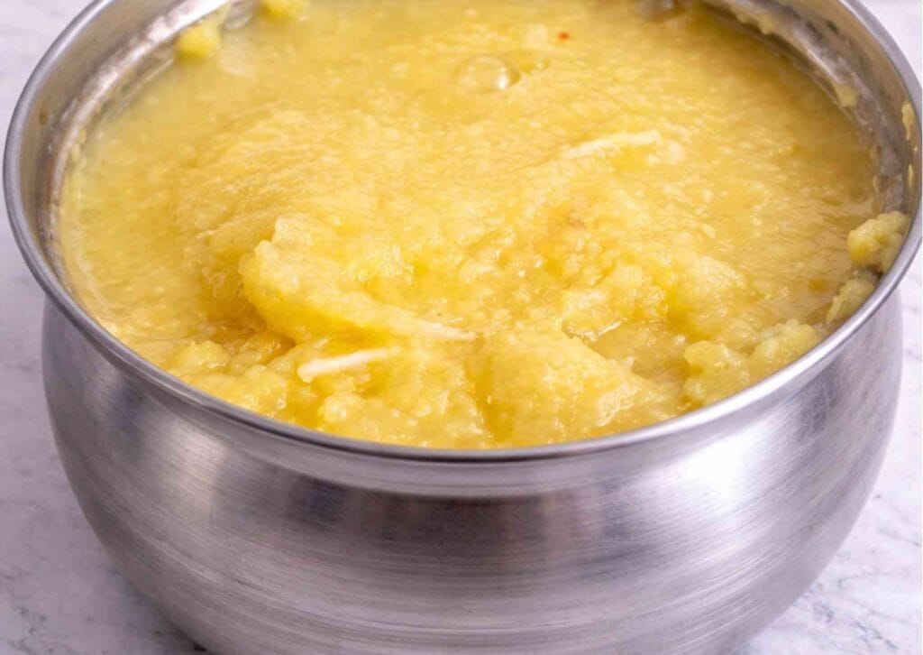 Freshly ground ginger garlic paste stored in container | small batch homemade ginger garlic paste