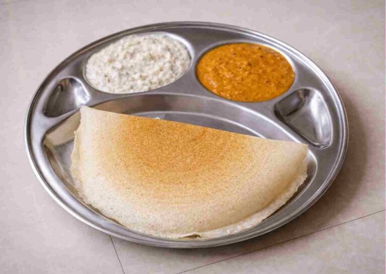 Healthy jowar dosa recipe served with coconut chutney and tomato chutney crispy cholam dosai millet dosa