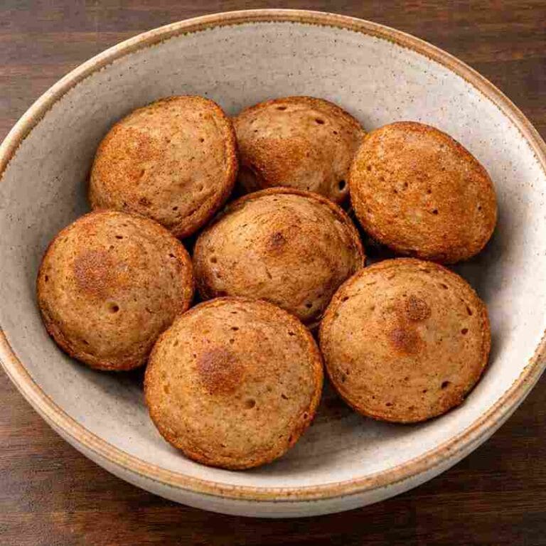 kuzhi paniyaram sweet made with red rice and karupatti