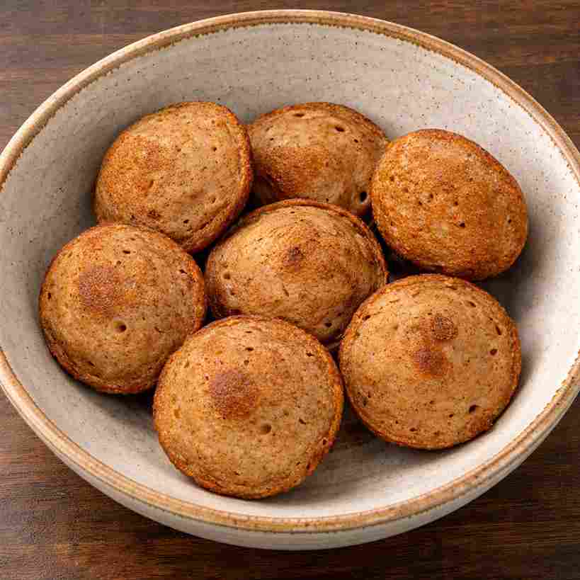 kuzhi paniyaram sweet made with red rice and karupatti