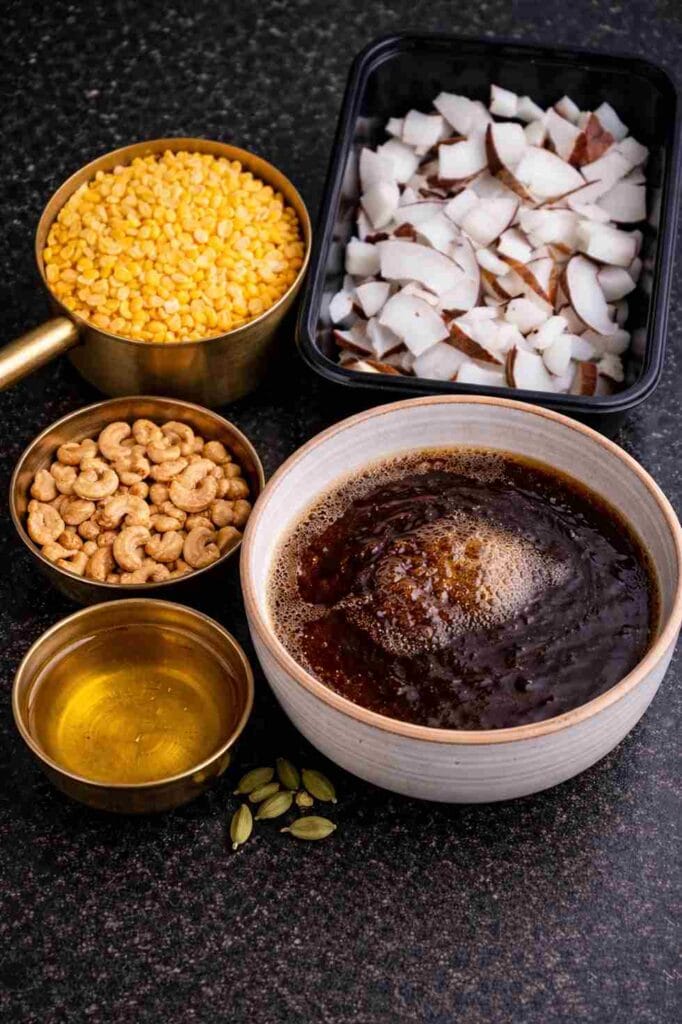 Ingredients for thengai therattipal including fresh coconut, palm jaggery syrup, moong dal, ghee, cashew nuts and cardamom