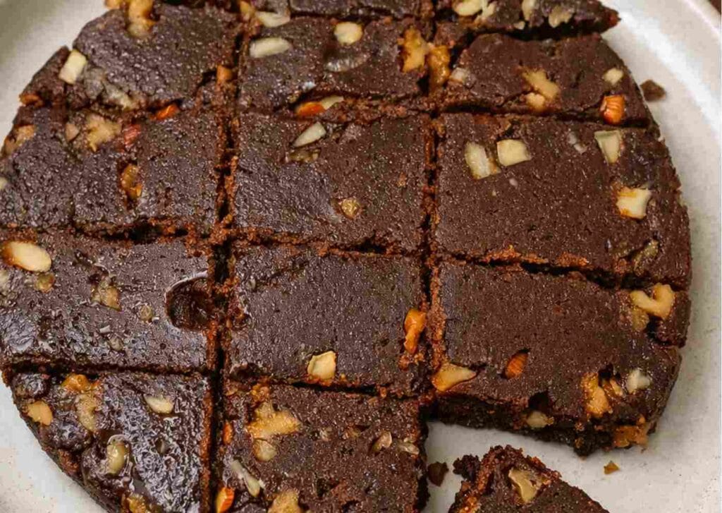 Soft ragi burfi with palm jaggery cut into squares with cashews and walnuts