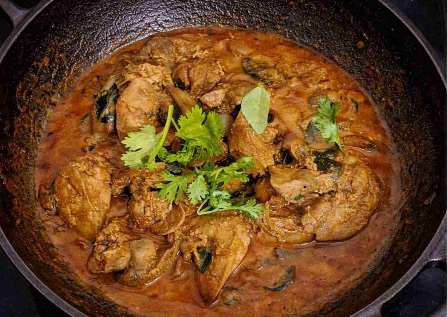 spicy chicken liver curry with gravy in kadai