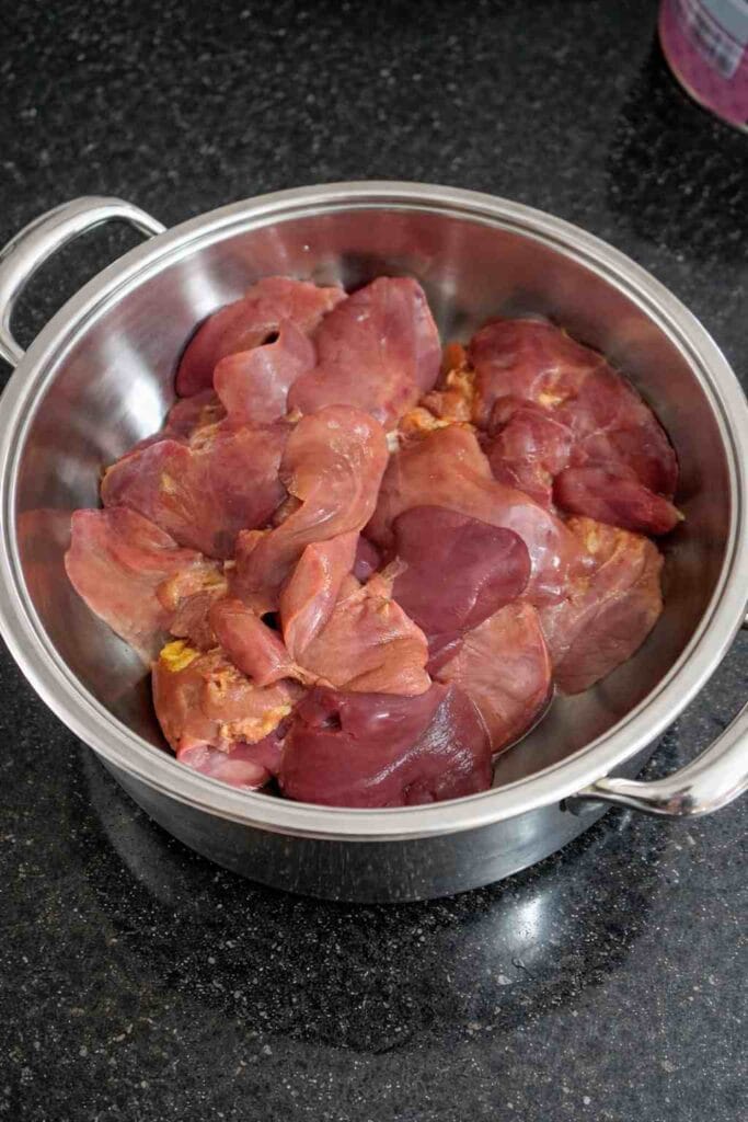 cleaned chicken liver pieces in stainless steel bowl