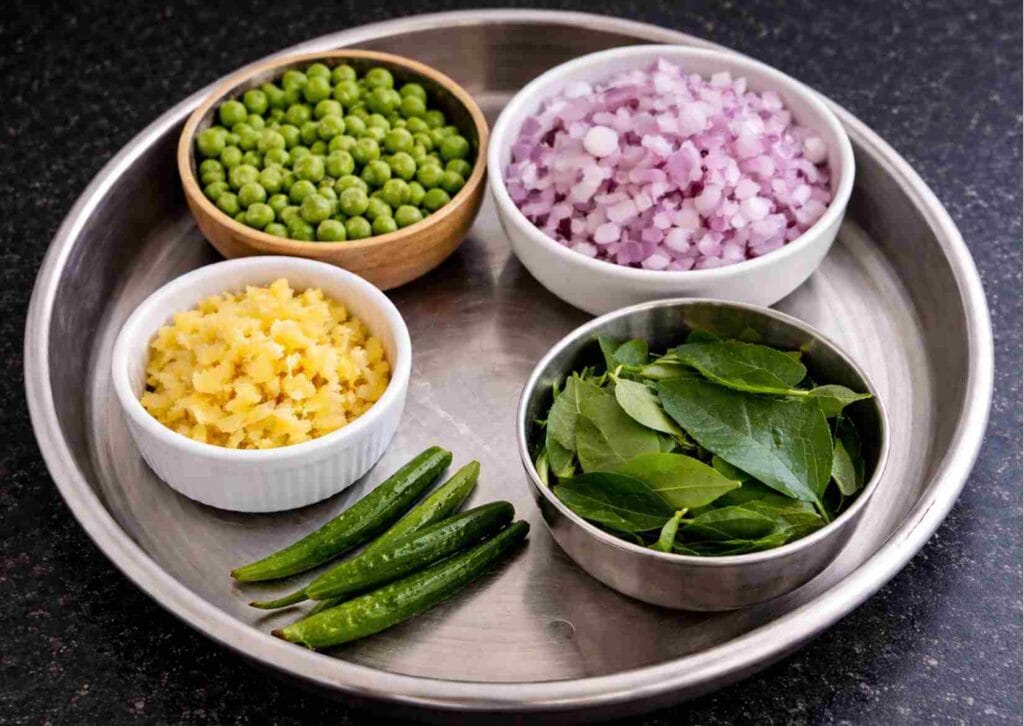 ingredients for urulaikilangu pattani masala potato peas onions ginger curry leaves green chilli