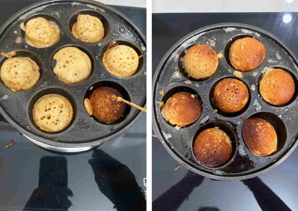 Flipping paniyaram in pan to cook evenly until golden brown