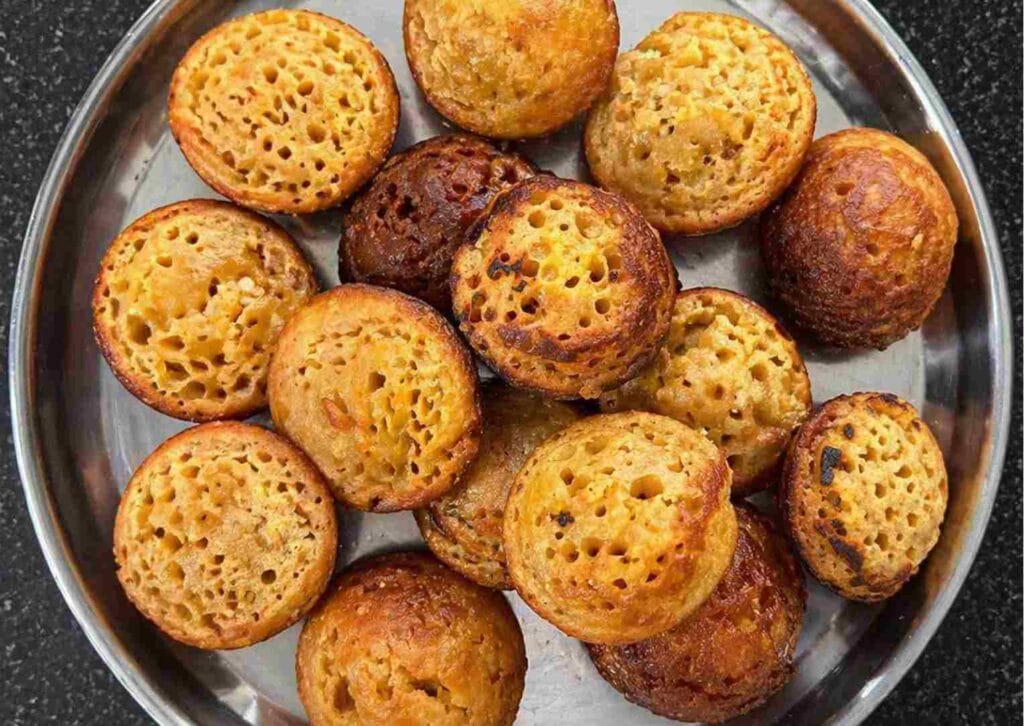 Golden brown sweet paniyaram served hot soft inside crispy outside