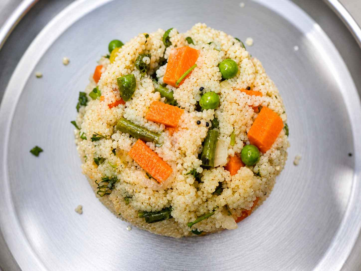 Kodo millet upma recipe made with vegetables in pressure cooker