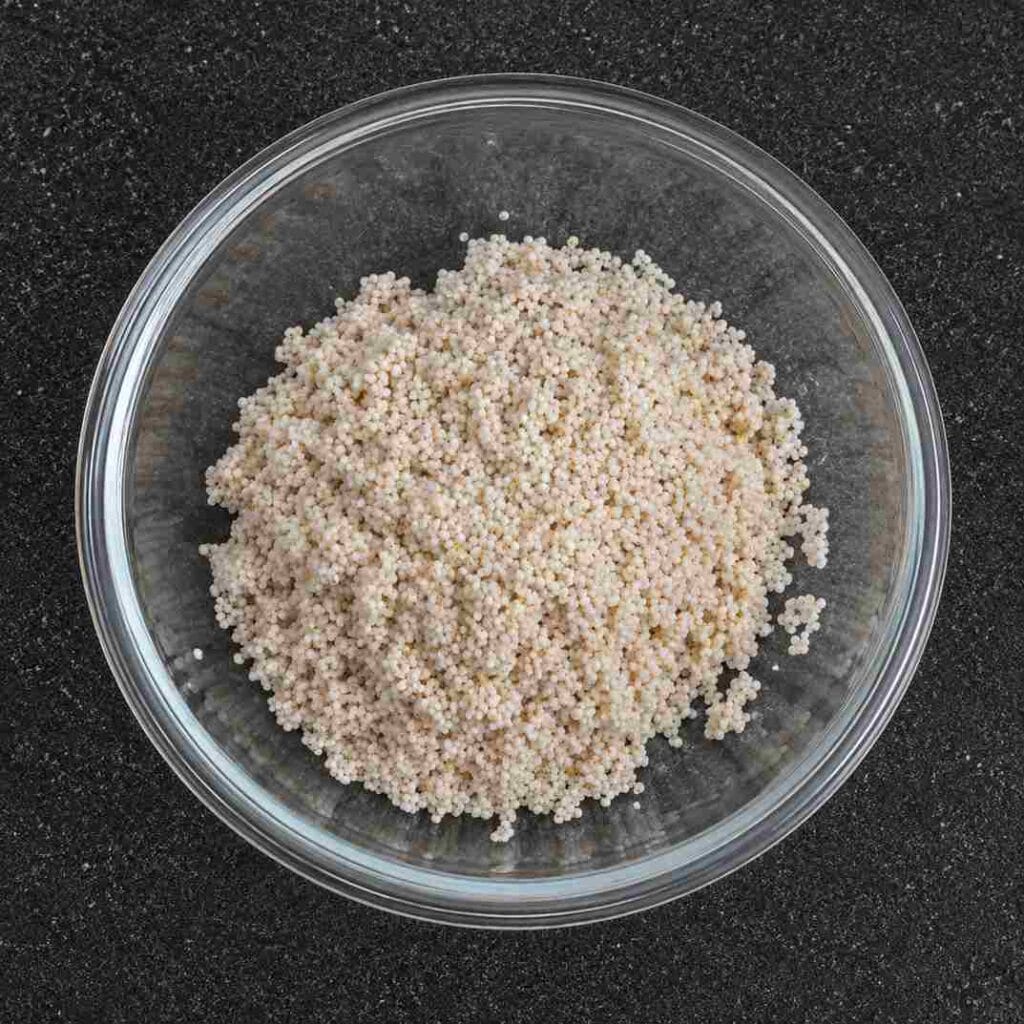 Washed varagu arisi prepared for making kodo millet upma recipe