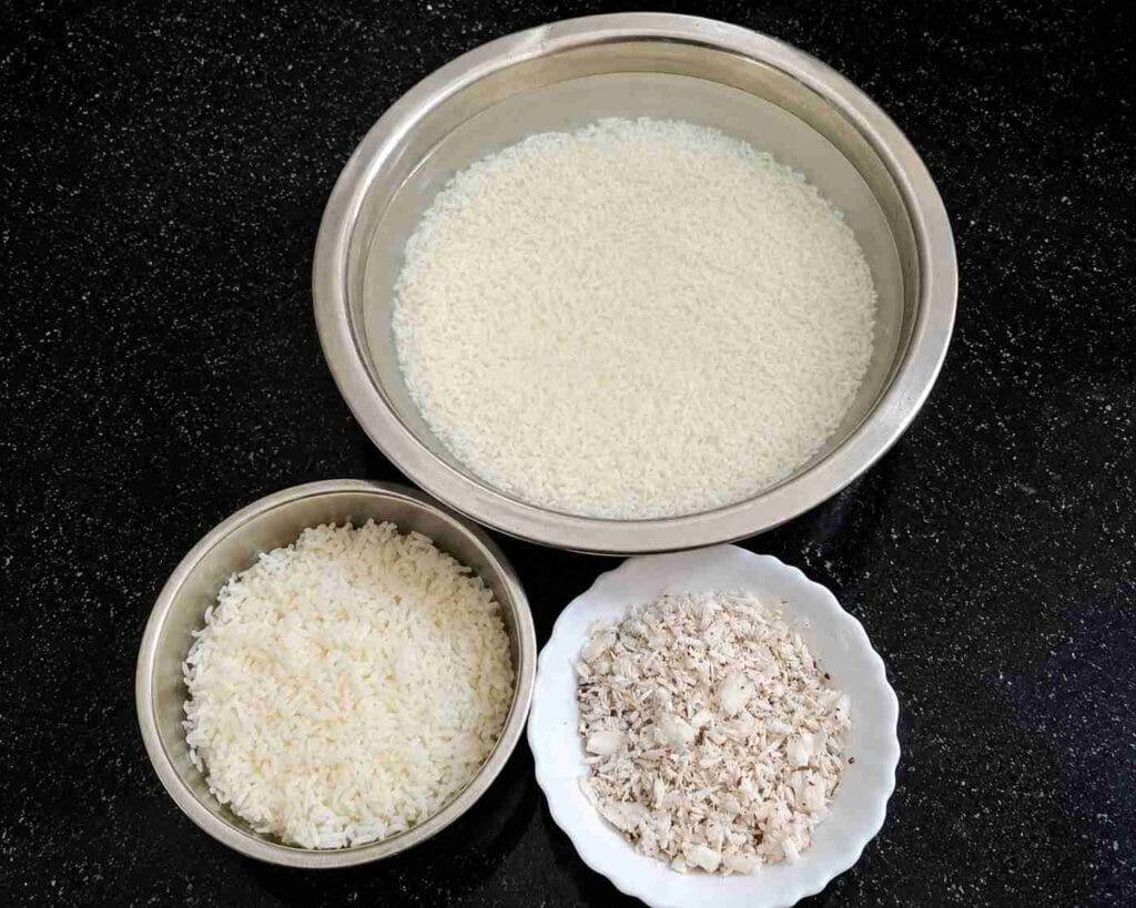 Ingredients for soft coconut dosa recipe with rice, leftover rice, and fresh coconut.