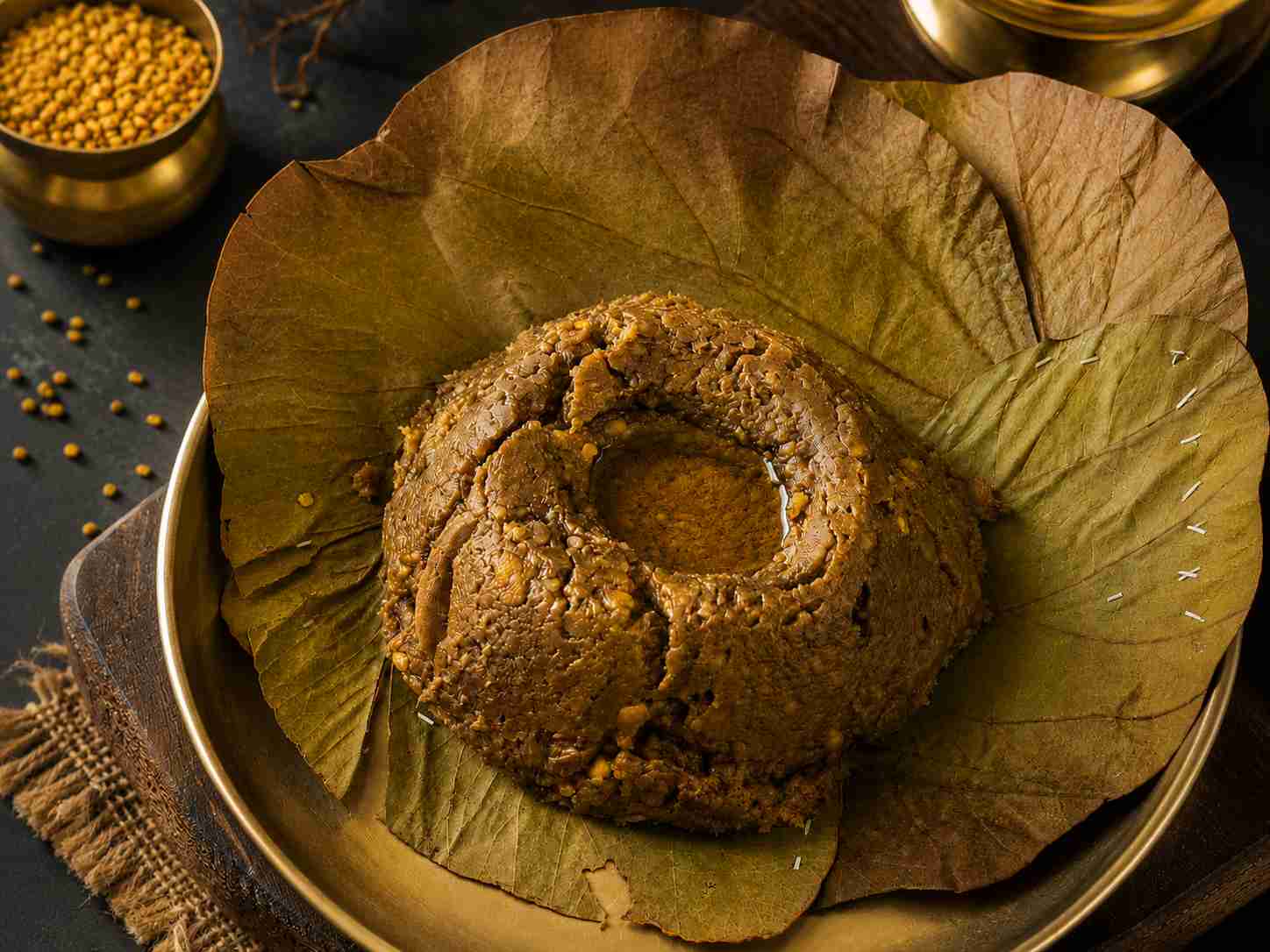 Vendhaya kali recipe served on mandharai leaf with sesame oil