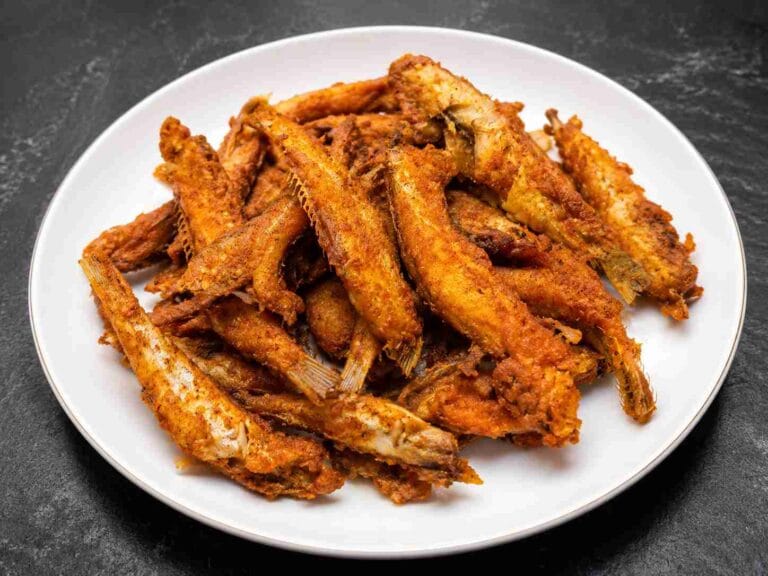 Crispy nethili fry recipe served in a plate with spicy golden brown masala coating.