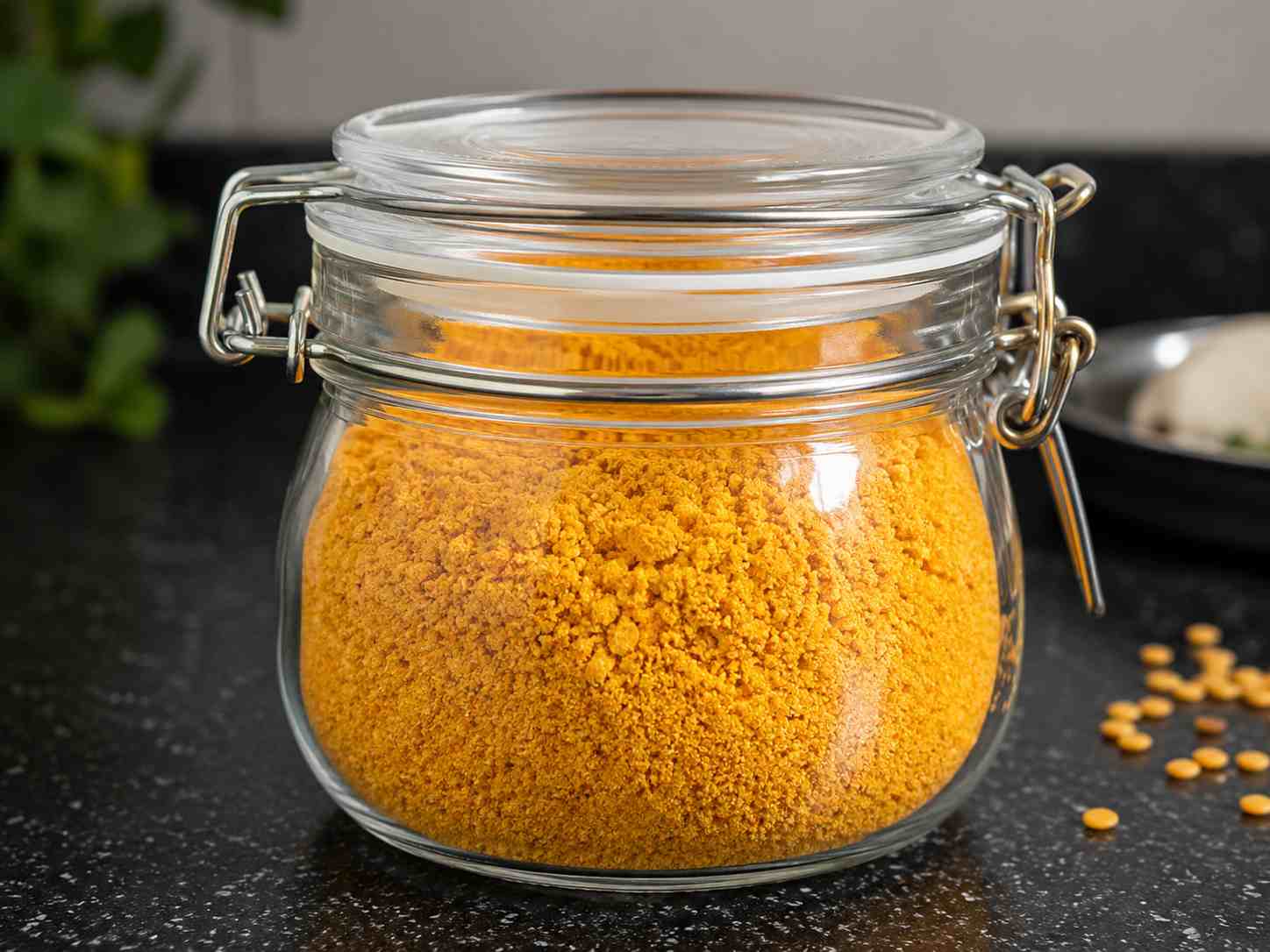 Idli Podi Recipe stored in a glass jar for serving with idli and dosa
