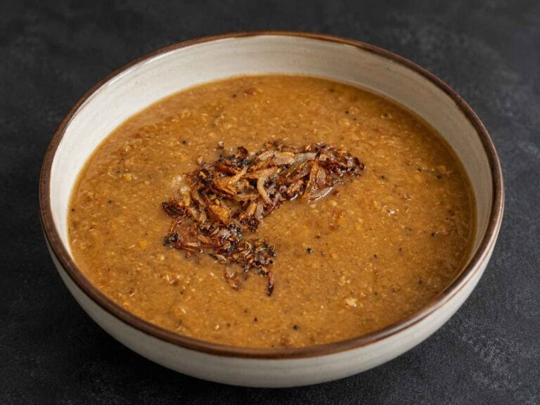 Kollu Paruppu Recipe made with horse gram and topped with golden onion tempering