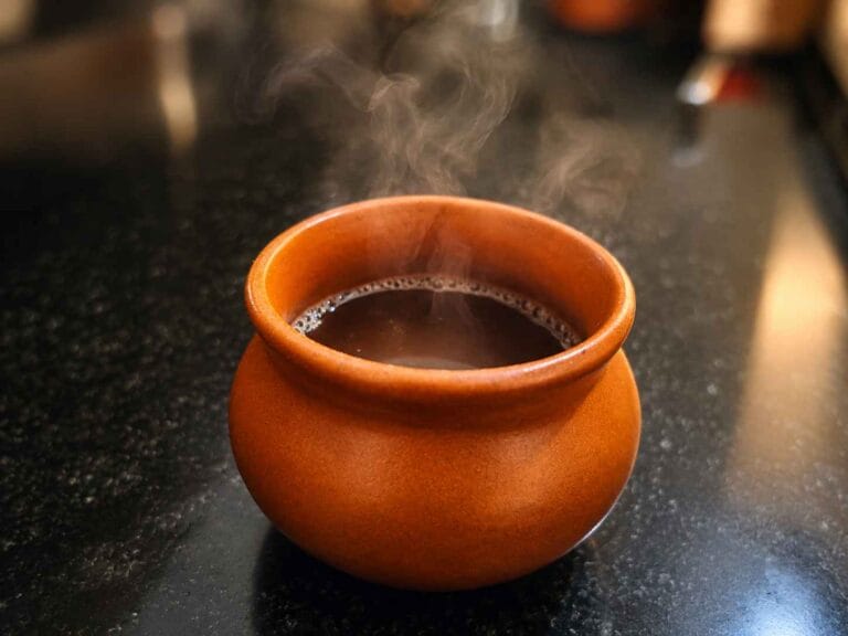 Sukku Malli Coffee Recipe served hot in a traditional clay pot with steam rising