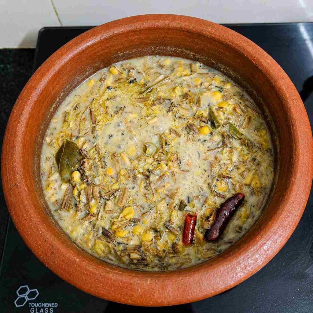 Traditional Vazhaipoo Dal Recipe made with banana flower and channa dal in a clay pot.