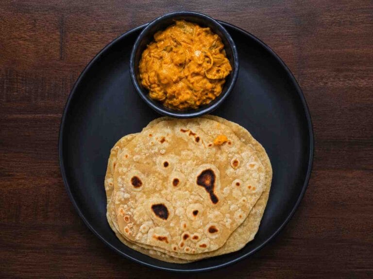 Creamy capsicum curry served with soft chapati as a quick and flavorful homemade side dish.