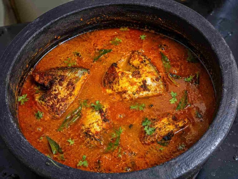 Vavval Meen Kulambu with fried pomfret pieces in spicy red gravy